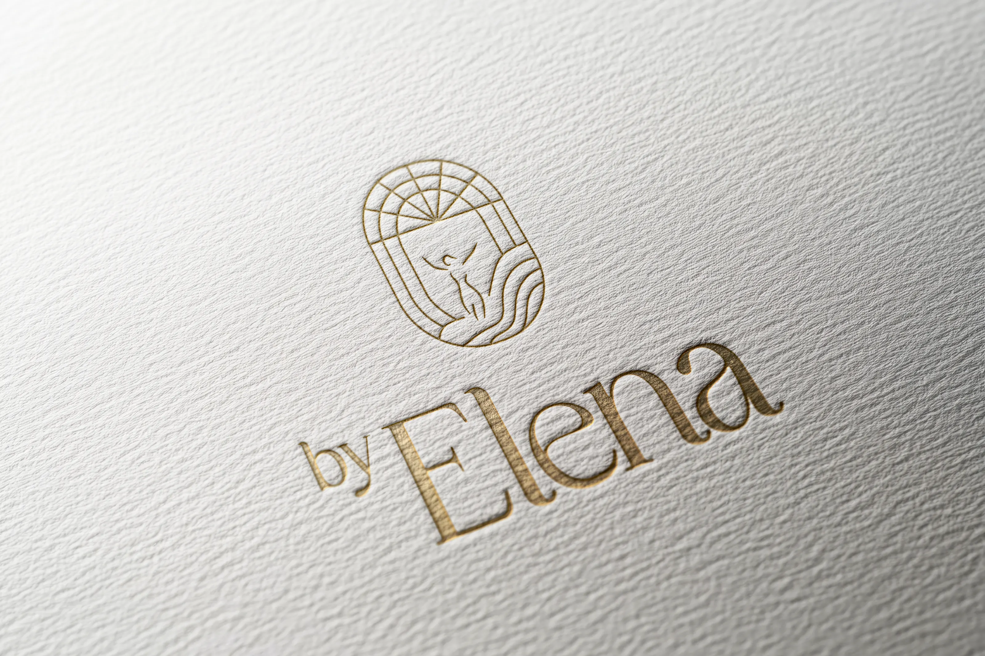 Logo by Elena als Goldprägung auf Papier, madea